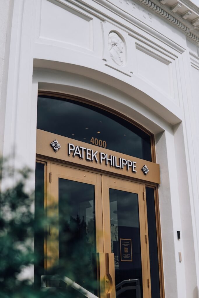 the front entrance of a building with a sign on it